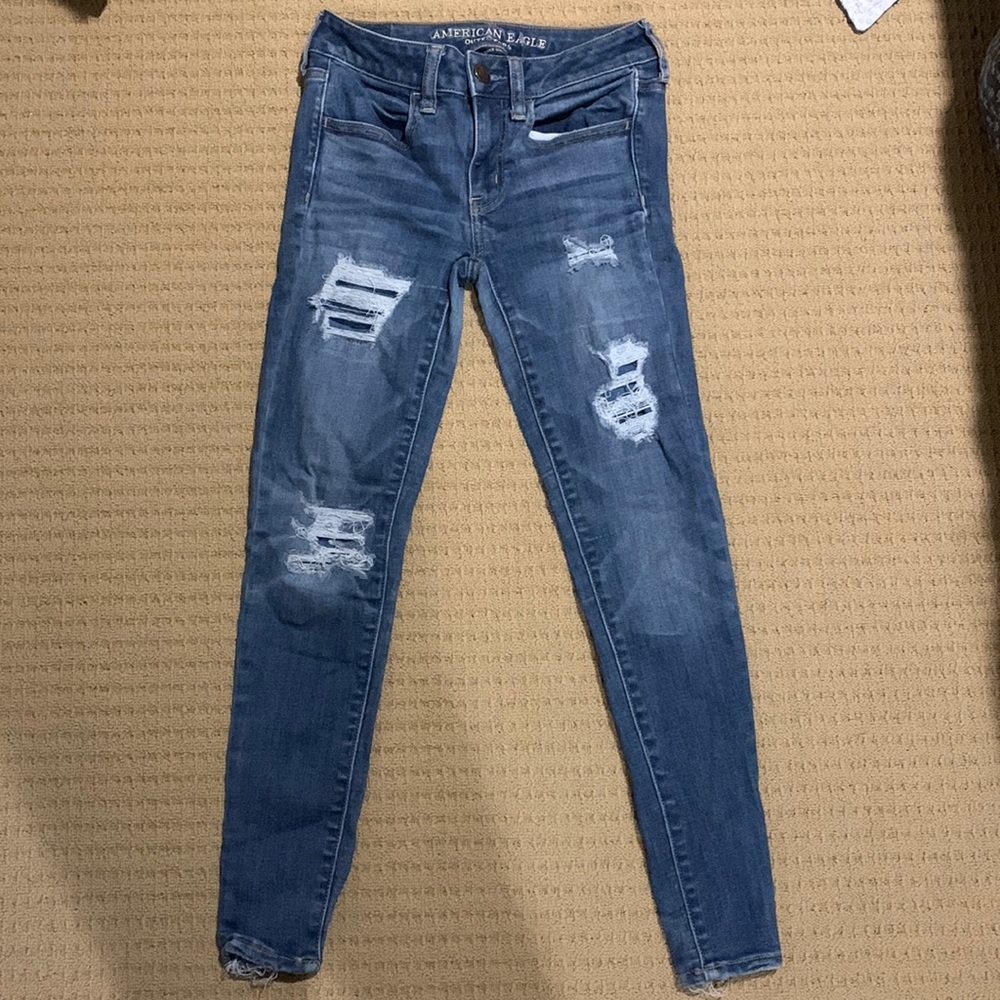 American Eagle jeggings with rips, size 2